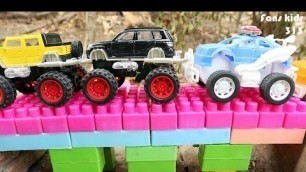 'Cars toy videos for Children, Monster trucks for children, build bridges with truck trailers'