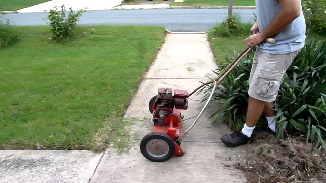 '1964 Toro Sportlawn Highcut 21 gas powered reel mower'