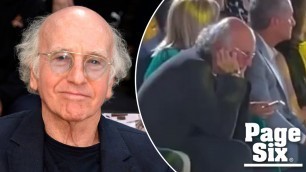 'Larry David plugs his ears in viral runway video from NYFW | Page Six Celebrity News'