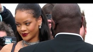 'Rihanna reminds everyone she\'s pregnant in a new see-through dress for DIOR fashion show in Paris'