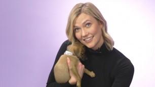 'Karlie Kloss Plays With Puppies While Answering Fan Questions'