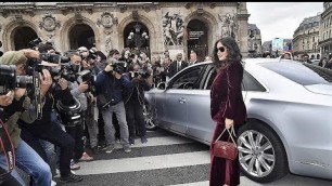 'Salma Hayek At The Stella Mccartney Show For Paris Fashion Week In A Claret Coloured Velvet Suit'