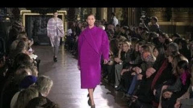 'Models and designer on the runway for Stella McCartney\'s fashion show'