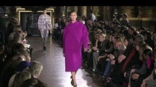 'Models and designer on the runway for Stella McCartney\'s fashion show'