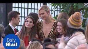 'Always time for the fans! Karlie Kloss in gold at Valentino show - Daily Mail'