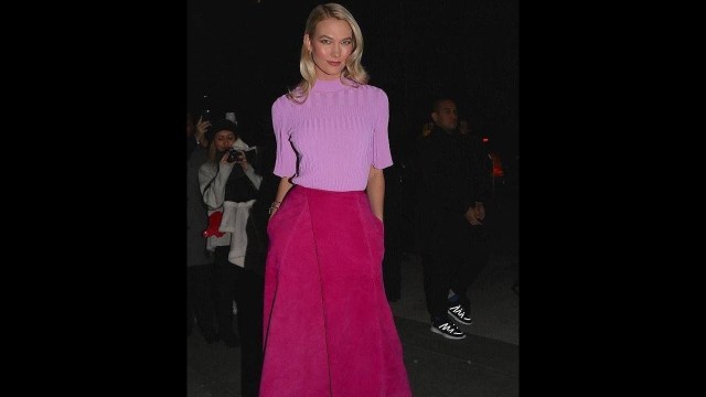 'Karlie Kloss dons retro fitted sweater and hot pink skirt'